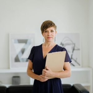 A Woman Holding a Clipboard