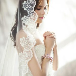 Woman in White Bridal Gown Meditating